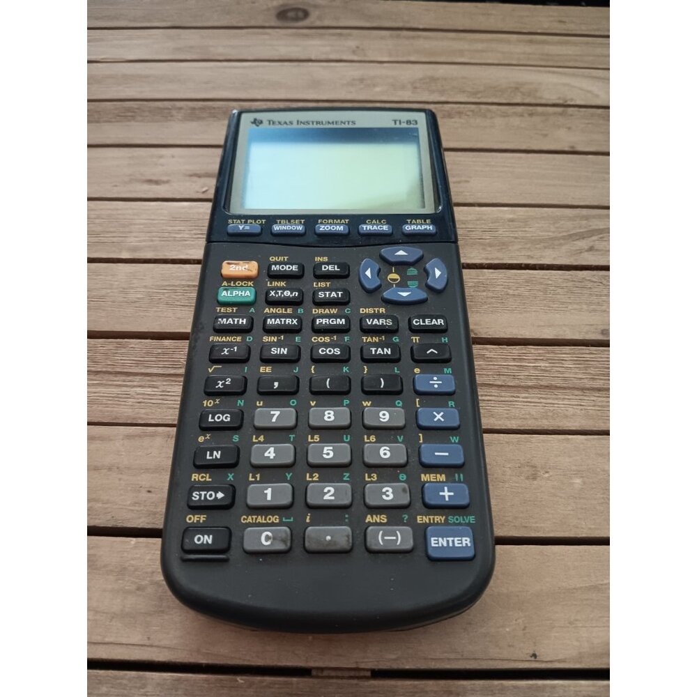 Texas Instruments TI-83 Graphing Calculator in Working Condition No Cover